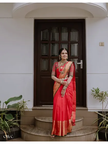 A smiling bridal portrait, capturing the bride's happiness on her special day.