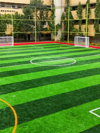 Another angle of our versatile turf at the VET Campus in JP Nagar. With two goalposts set up, it's ideal for a competitive football match or a casual kickabout with friends.