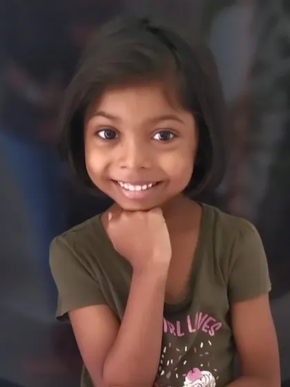 Another adorable shot of our young client, happy with her chic and easy-to-manage bob.