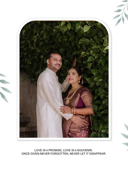 A lovely couple's portrait from a traditional maternity shoot. The couple stands together against a backdrop of green foliage, sharing a gentle and happy moment that highlights their bond.