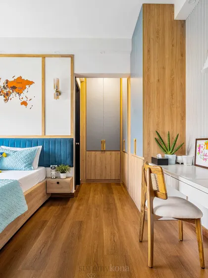 A wider view of the kids' room, showing how the different functional zones flow together seamlessly.