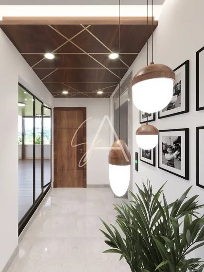 A well-designed hallway can be a feature in itself. Here, a wooden ceiling with brass inlays, modern pendant lights, and a gallery wall of family photos create a warm and personal transition space.