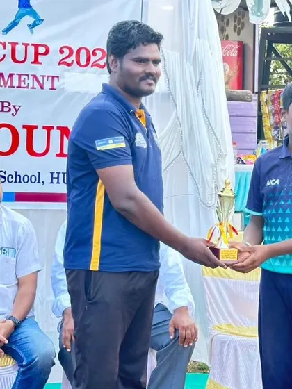 Jeevan G receiving the Player of the Match award at the Dasara Cup Hubli finals.
