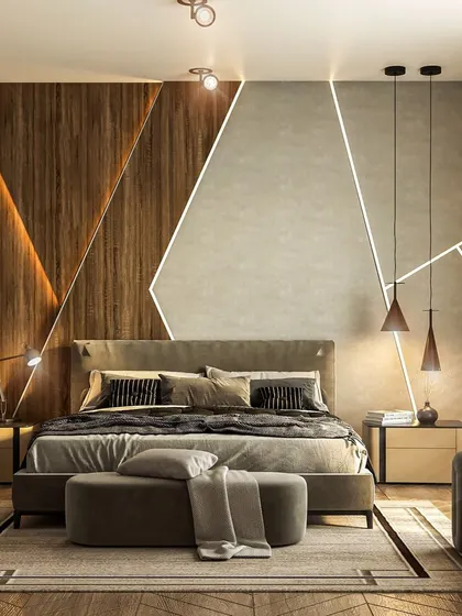 A modern bedroom featuring a striking accent wall with geometric wood paneling and integrated LED lighting. The mix of textures and warm tones creates a dynamic yet cozy atmosphere.