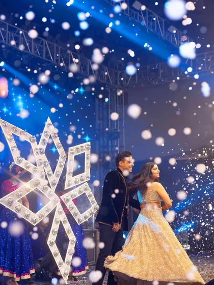 Creating a winter wonderland theme for a couple's dance. We used giant illuminated snowflake props and a snow machine to bring a touch of magic and romance to their performance.