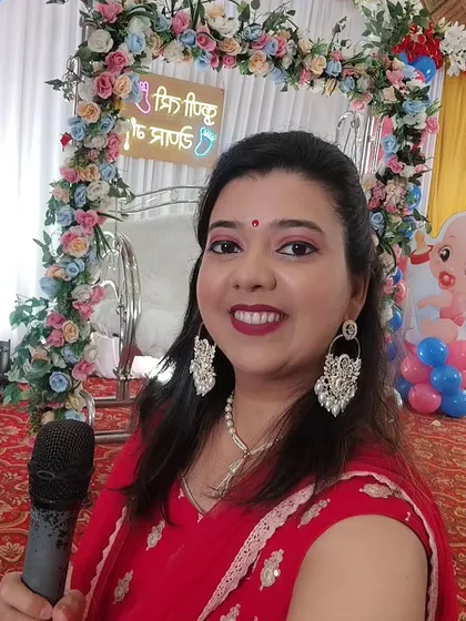 As your host and friend, my goal is to bring a warm smile and infectious energy to your special day. Here I am, mic in hand, ready to kick off a beautiful baby shower celebration in Mumbai.