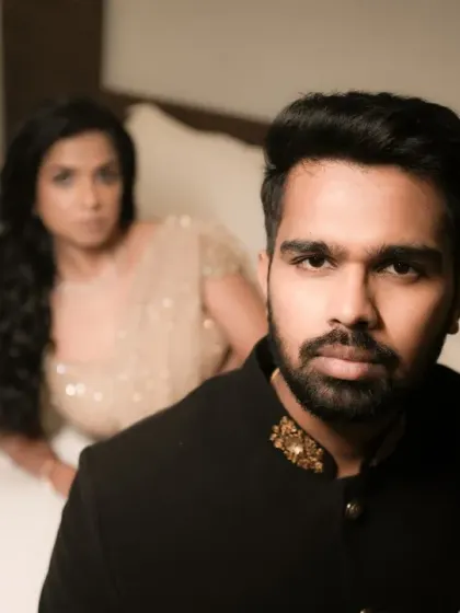 A powerful, direct-to-camera portrait of the groom. This kind of shot has a strong, confident feel, perfect for a magazine-style album.
