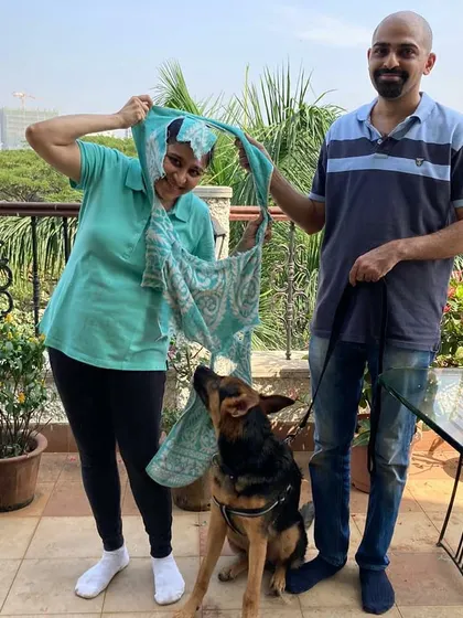 Even during training exercises, there's always time for a little fun. This photo captures a playful moment while practicing desensitization exercises with a German Shepherd, showing that training can and should be enjoyable.