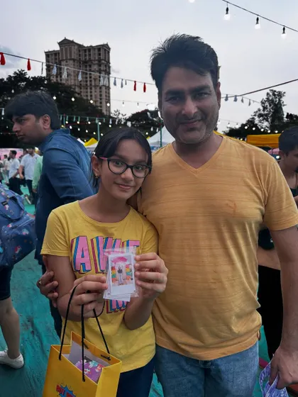 Some happy faces from my live customization event. This father and daughter were thrilled with their personalized Polaroid magnet.