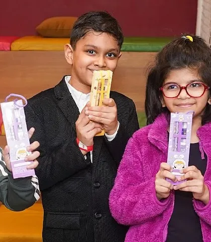 Children showing off the fun party favors they received.