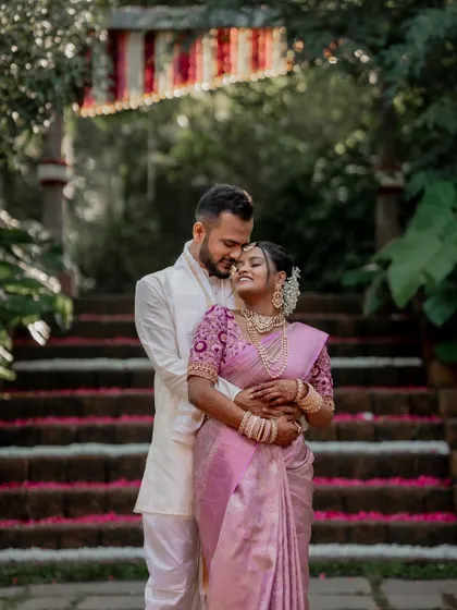 A playful and romantic moment on the steps of The Peacock Grove. We encourage our couples to be themselves, which allows us to capture their unique personalities and connection.