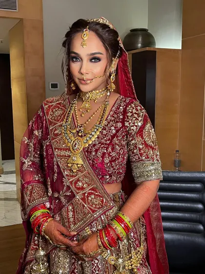 The bride looks fierce and beautiful, ready to make a statement on her wedding day.