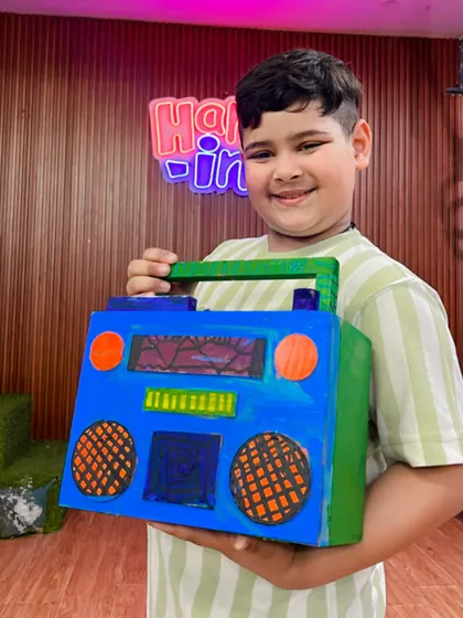 This student went for a cool blue and green color scheme for his handmade boombox.
