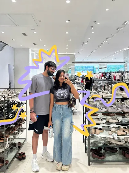 A shopping trip with my boyfriend, with a fun purple and yellow doodle to frame us.