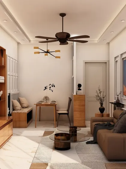 The living room area from the same project, showing the layout with the TV unit, sofa, and a small side table, designed for a modern family home.