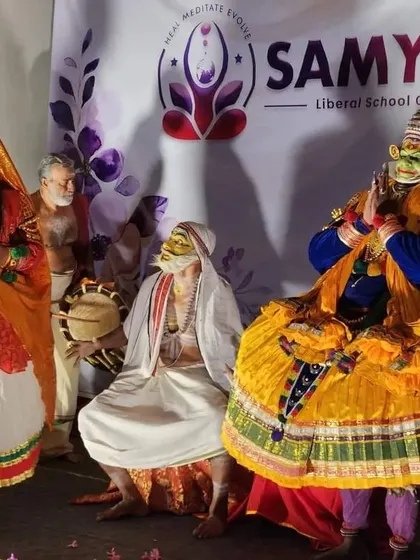 Spirituality is also a celebration of culture and life. Here, participants witness a vibrant, traditional Kathakali performance during our Kerala retreat, an experience that connects us to the rich artistic soul of the land.