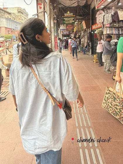Life lately. A candid shot of me navigating the bustling lanes of Chandni Chowk, one of my go-to spots for wedding shopping.