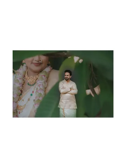 A creative double-exposure portrait of the groom, blending his image with a photo of his bride for an artistic and meaningful shot.