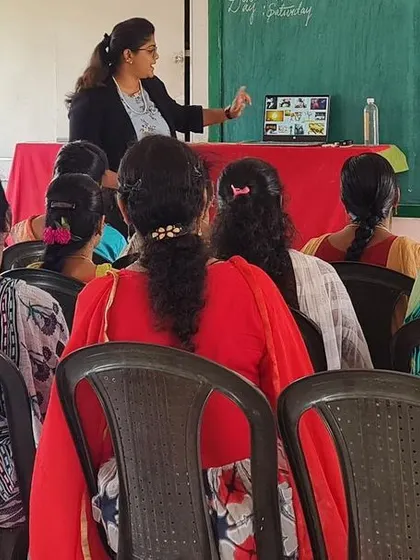 Presenting to a full room of teachers. My training for educators covers everything from grooming and dress code to strategies for handling difficult classroom situations with poise.