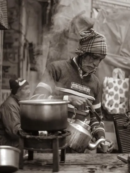 A series of portraits and street scenes from the ghats and alleyways of Varanasi. They feature locals, pilgrims, animals, and the photographer himself, painting a rich picture of daily life.