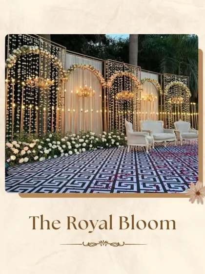 Inspired by royalty, this "Royal Bloom" stage features multiple arches adorned with flowers and elegant chandeliers. The patterned flooring and classic white seating complete a look of grandeur and opulence for your big day.