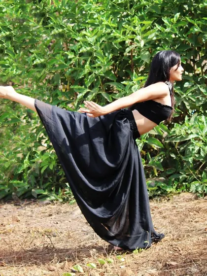 A photo of me in a flowing dance-like pose, surrounded by nature. Sometimes the longer you wait for something, the more you appreciate it when it arrives.