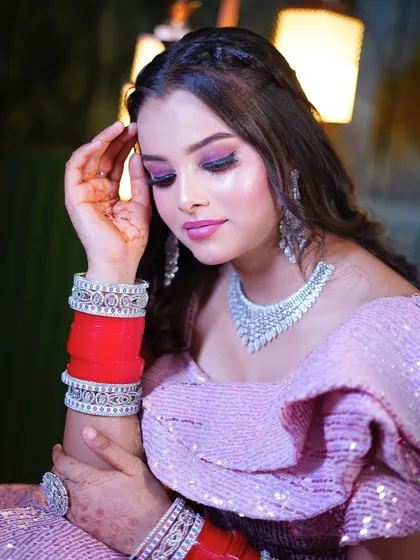 A close-up portrait in the pink sequin gown, showing how it beautifully complements bridal accessories.