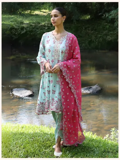 This pastel blue kurta with a vibrant pink dupatta is a dreamy combination. It's one of my favorite festive picks.