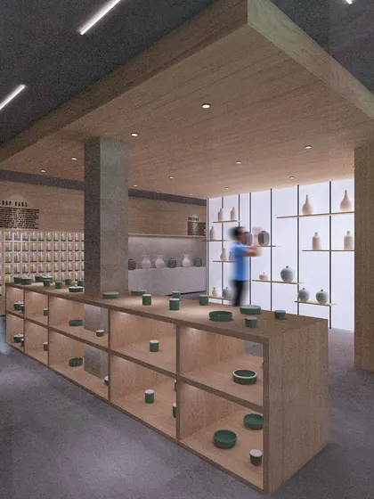 A render of a pottery museum and retail concept. The central display island and surrounding shelves are strategically lit to guide visitors through the collection, turning the simple act of browsing into a curated journey.