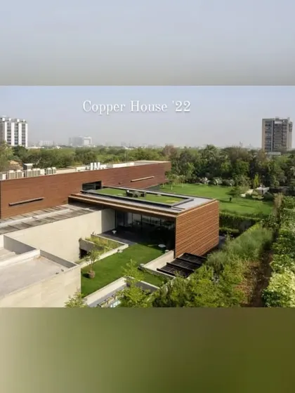 The "Copper House" in Ahmedabad, where I designed the landscape to include multiple green roofs and integrated planters. The greenery on different levels of the building helps it merge with the surrounding garden.