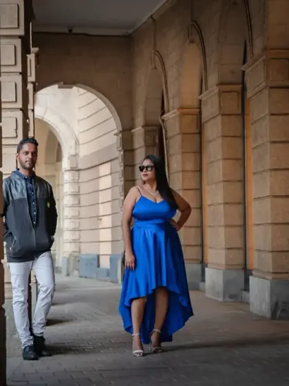 A stylish, editorial-style pre-wedding shot using the strong lines and shadows of a corridor. This shows how we can play with composition to create a more dramatic and modern portrait.
