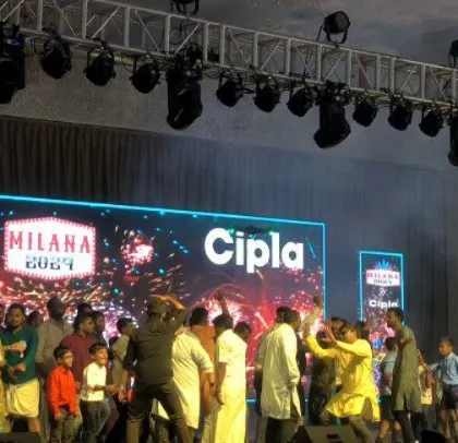 Kids and families dancing on stage at the Cipla family day. My events are for all ages, and the large-scale setup ensures everyone feels included.