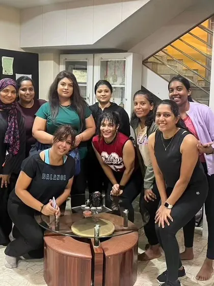 The heart and soul of my classes. Each photo captures a unique moment with my incredible community after a sweaty, joyful session. This is our shared victory lap.