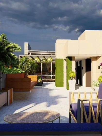 Another perspective of the same luxurious terrace, highlighting the deep purple seating that complements the vibrant bougainvillea. This design proves that a rooftop can become as lush and inviting as any ground-level garden.