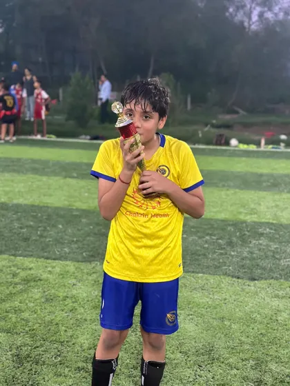 Kissing the trophy. A classic celebration from one of our players, showing his love for the game and for winning.