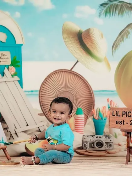 Beach day at the studio! Our beach theme comes with a beach hut, sand, and fun props to create a perfect summer vibe, no matter the weather.