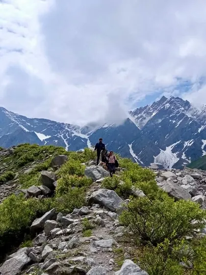 The rocky terrain near Beas Kund, with the mighty Pir Panjal range in the background. Every step is an adventure here.