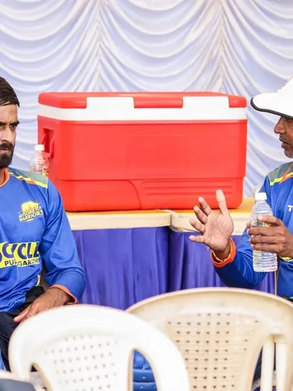 An enriching discussion with players during a break in training. Understanding a player's thoughts is key to helping them improve.