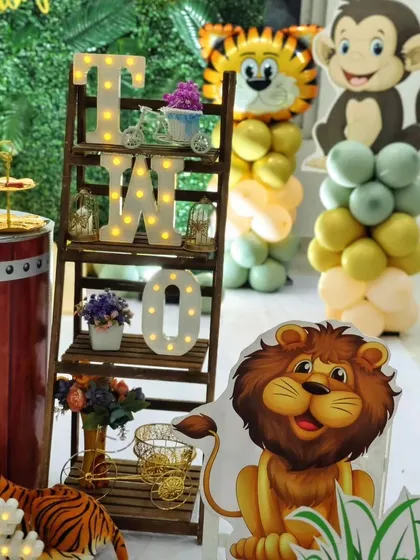 A close-up of the "TWO" marquee letters and other animal props from Avyaan's party.