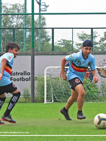 Two players engaged in a drill at our Shalimar Bagh center. The focus and determination are clear, even during practice.