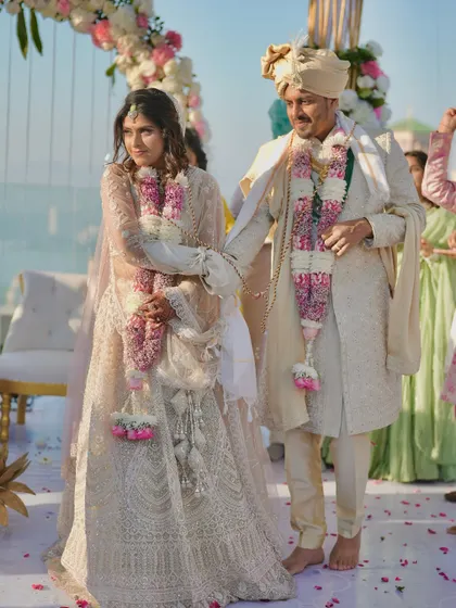 The sacred walk around the fire, with the couple tied together in a holy knot, symbolizing their inseparable bond.