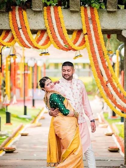 A fun and candid shot of the couple, with the groom dipping the bride. We love capturing the spontaneous moments of joy and laughter.