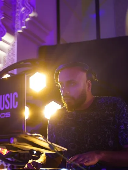 Focused on the mix. This is where the magic happens, feeling the beat and reading the energy of the crowd.
