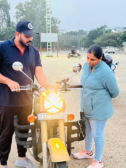 A practical demonstration of the bike's features. I walk each student through the controls, ensuring they know what every button and lever does.