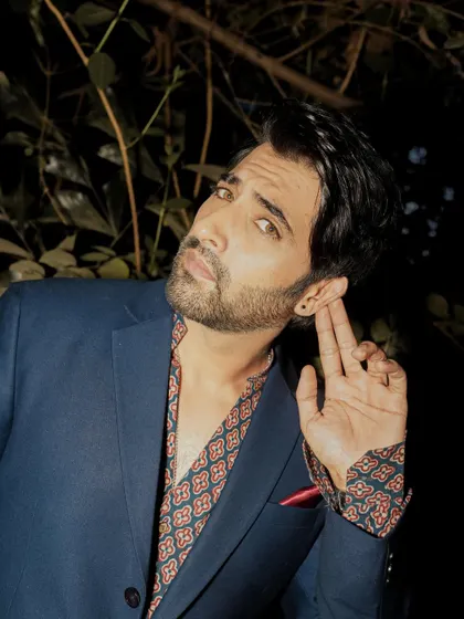 A close-up that captures an expressive, listening pose, adding a narrative element to the shoot.