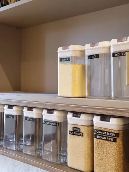 More pantry organization, this time for rice and flours. Labeling each container is crucial for quick identification during meal prep.
