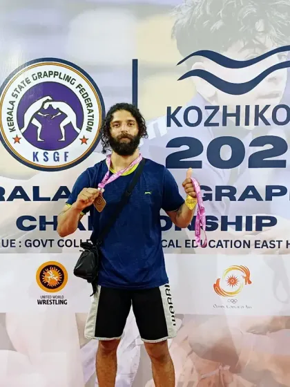 I don't just talk about training like an athlete, I live it. Here I am after winning two gold medals in the Kerala State Grappling Competition. My methods are tested and proven in real competition.