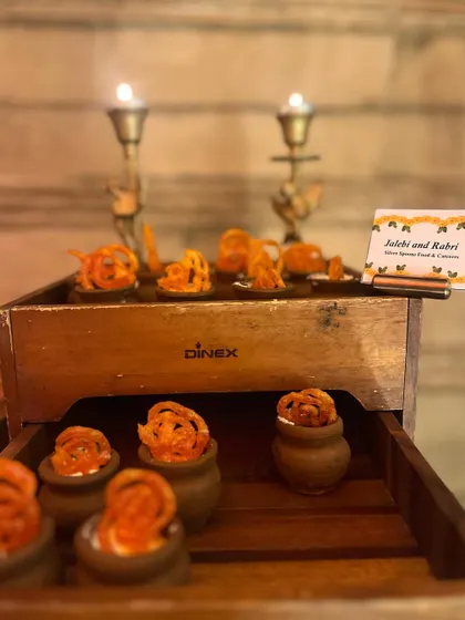 A classic Indian winter dessert, our Jalebi with Rabri is a warm and comforting treat. Crispy, syrup-soaked jalebis are served with thick, creamy rabri in traditional clay pots.