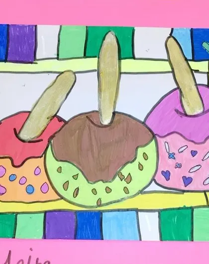 Another student's take on the candy apple theme, this time with a different color palette and patterns. It shows how individual creativity flourishes within our structured lessons.