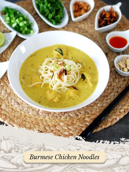 A comforting bowl of Burmese Chicken Noodles (Khao Suey). This dish, with its rich coconut curry and array of toppings, is a popular choice from our Pan-Asian menu.